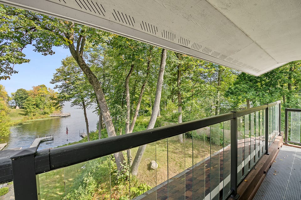 Master Bedroom private balcony with lakeshore views