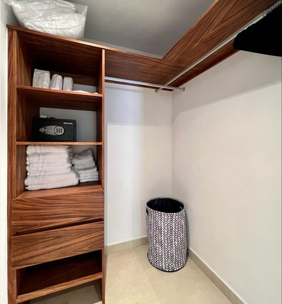 Walk-in closet with lots of storage in the primary bedroom.