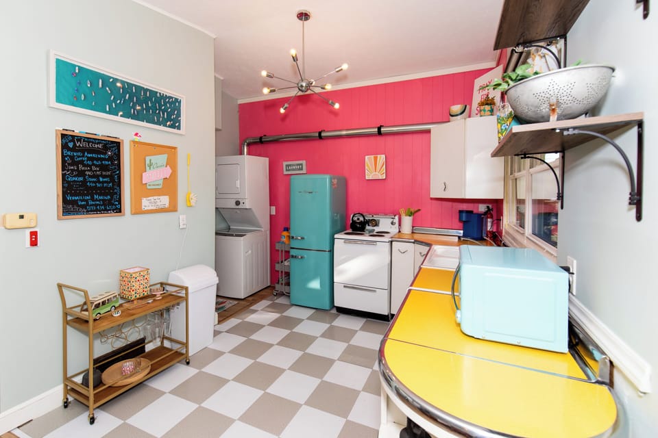 Whip up delicious meals in your vibrant, retro-inspired kitchen with colorful appliances and cheerful décor that makes cooking feel like play.