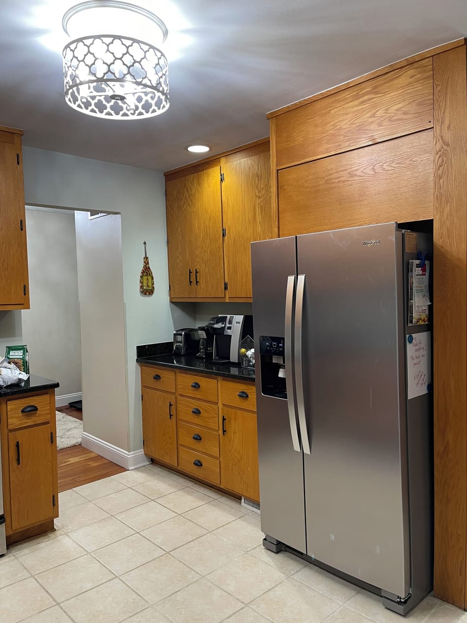 Brand new Whirlpool stainless side by side refrigerator with ice maker.