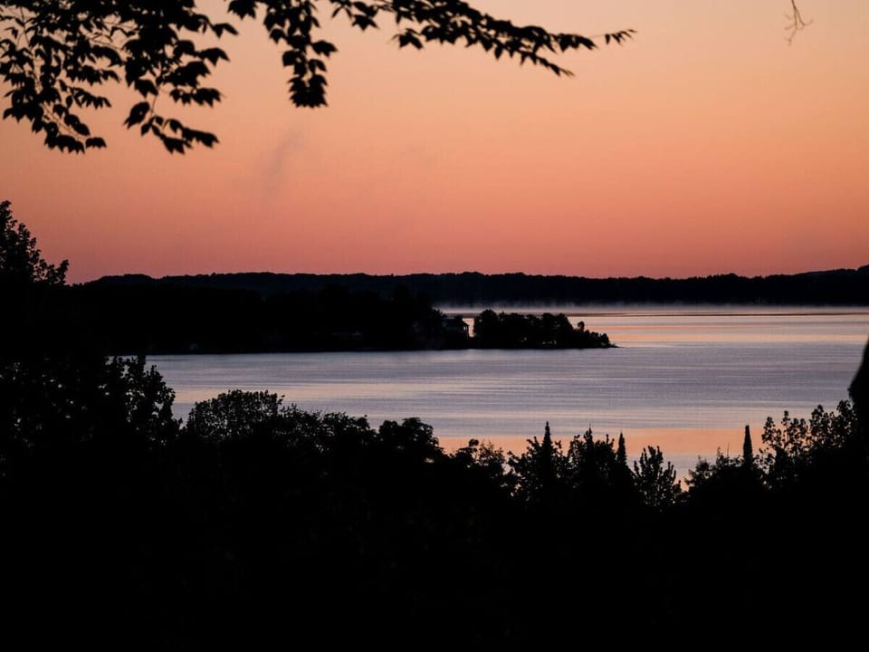 Lake Leelanau at sunset; these types of views can be expected from the balcony.