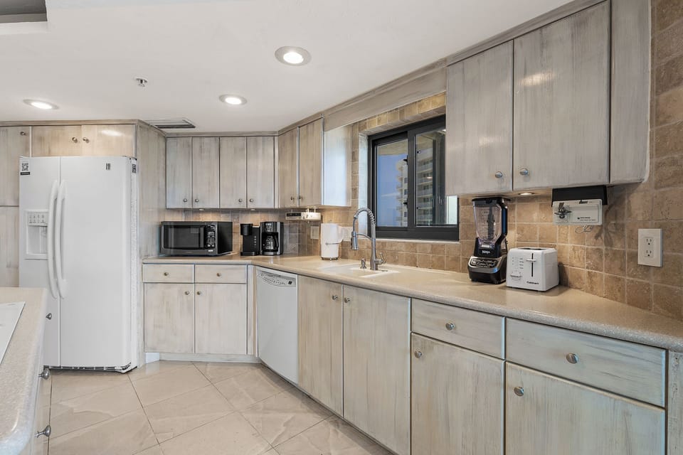 Kitchen with Sliding Balcony Door Access