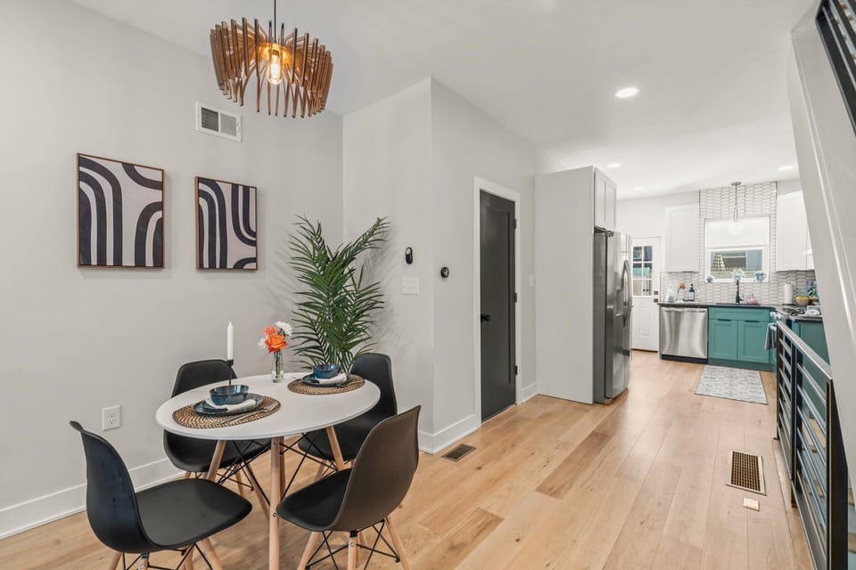 A seamless flow from dining to kitchen makes this home ideal for shared meals and easy entertaining.