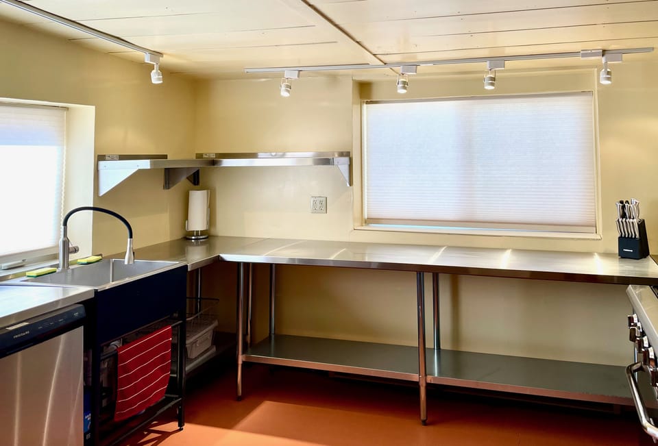 Plenty of workspace in this nice catering kitchen.
