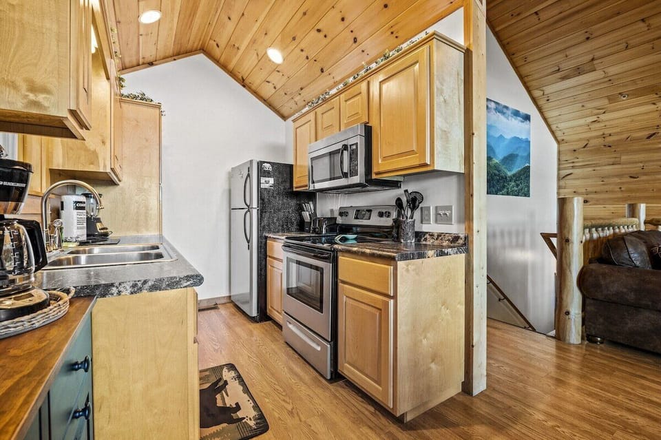 Open concept with beautiful vaulted ceilings.