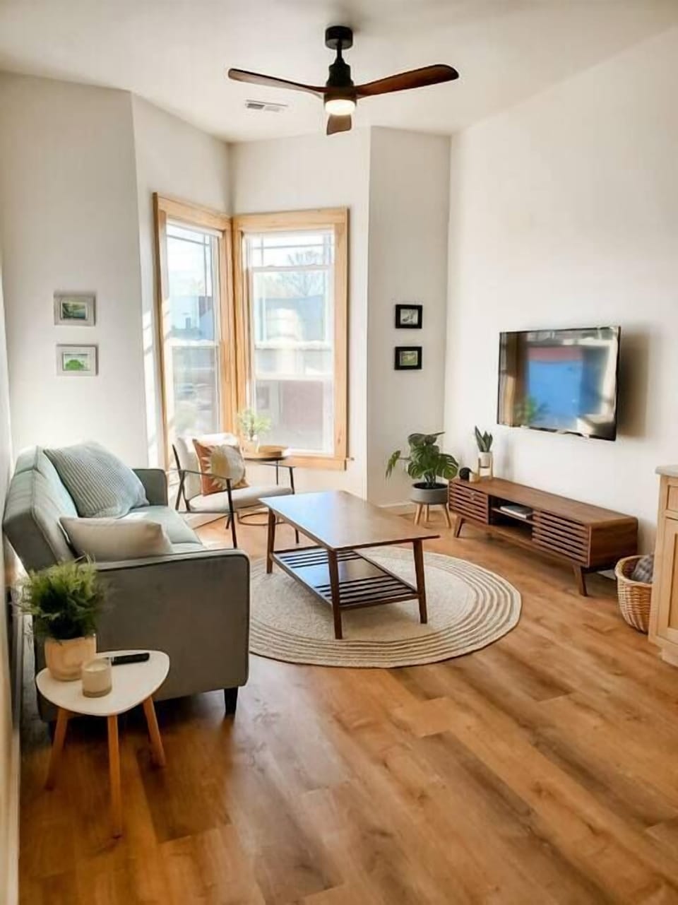 Beautiful living room with fold down couch and smart TV.