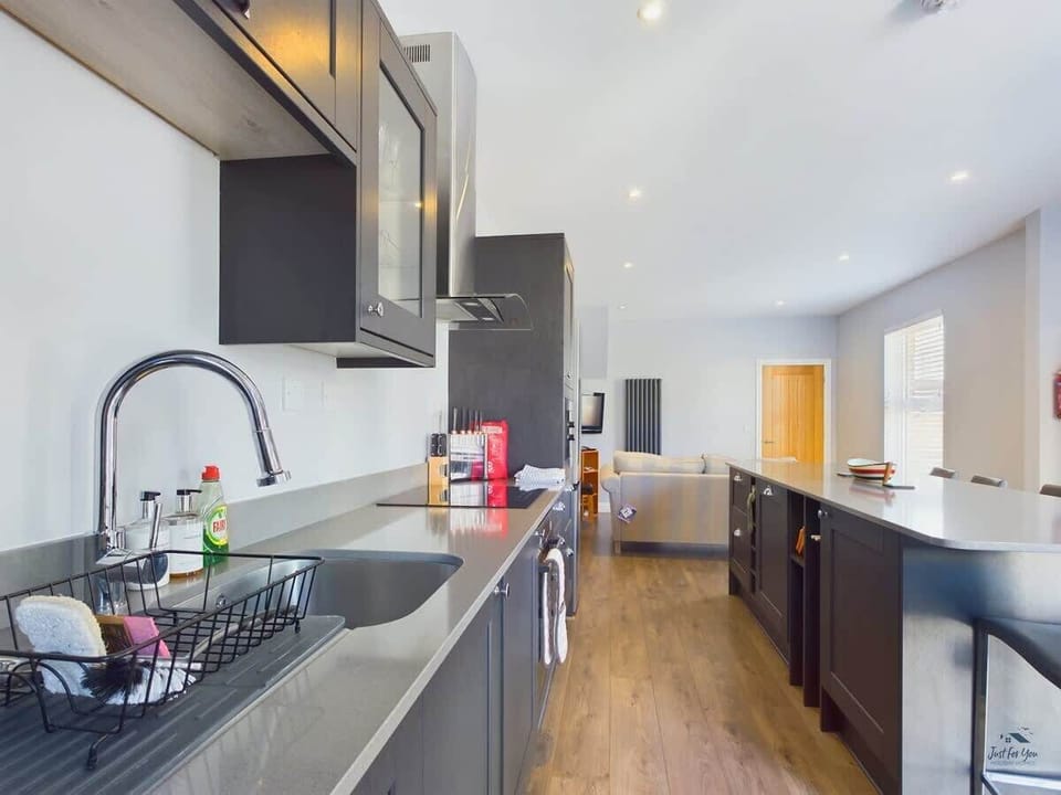 Seaside Cottage well equipped kitchen with dishwasher and oven.