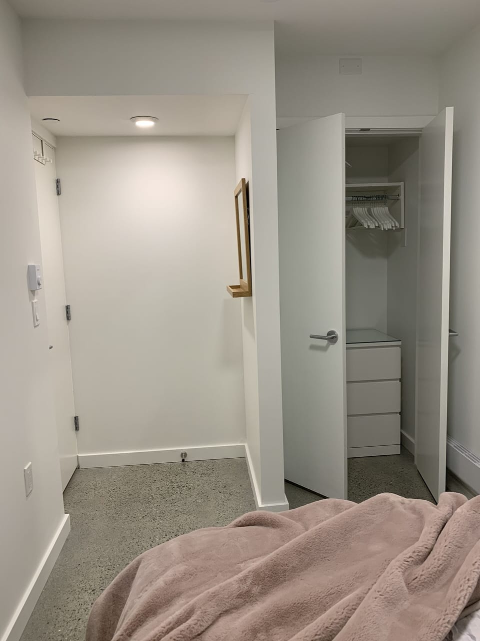 Bedroom (facing foot of bed and closet)