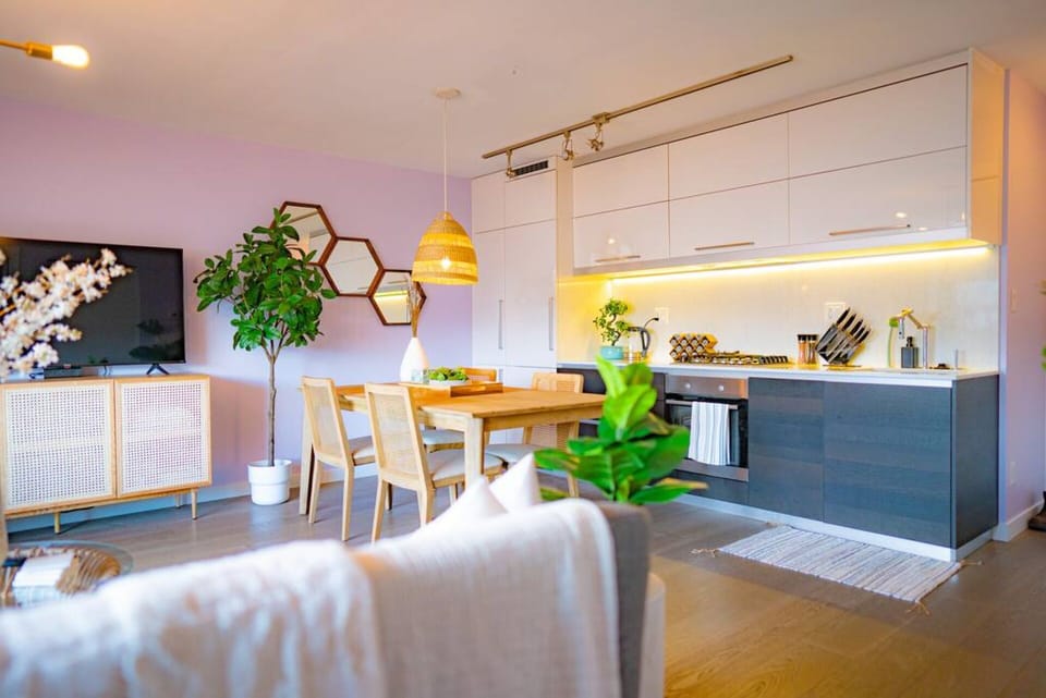 Open kitchen w/ seating for 4 on the dining table.