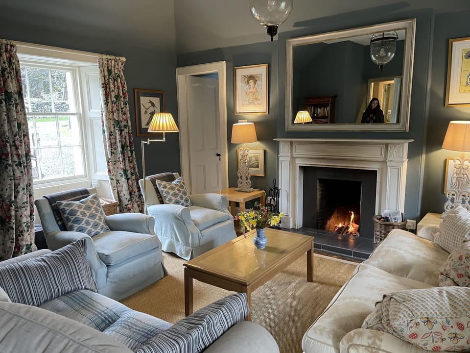 Sitting Room with open log fire.