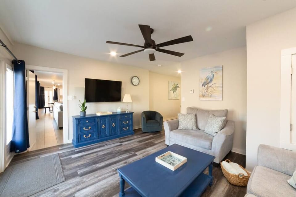 Living room with connecting door open into Blaizy Dayz