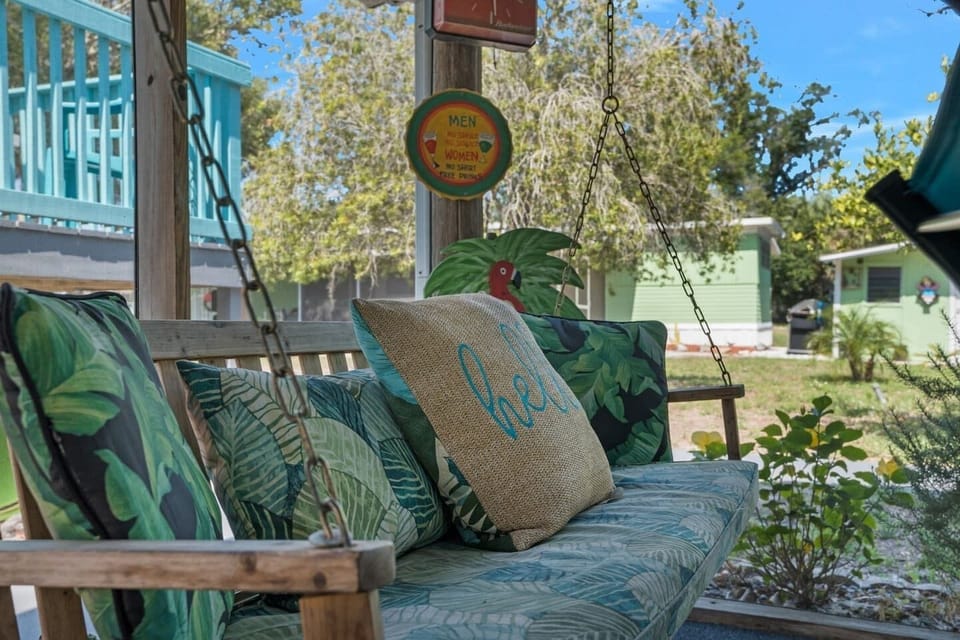 The porch swing in the lanai is the perfect spot to relax on a warm Florida day!