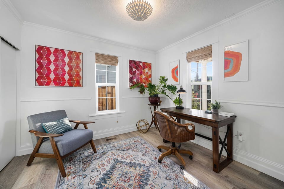Cozy office off of the living room separated by french doors