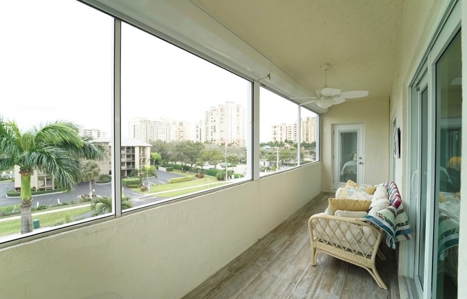 New porcelain tile in lanai with sofa and coffee table for your enjoyment