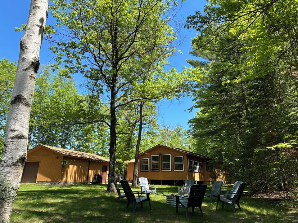 Level lot and walk to the shore/pier. New lakeside fire pit