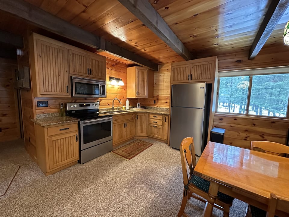 Updated kitchen photo with new appliances- open to main living