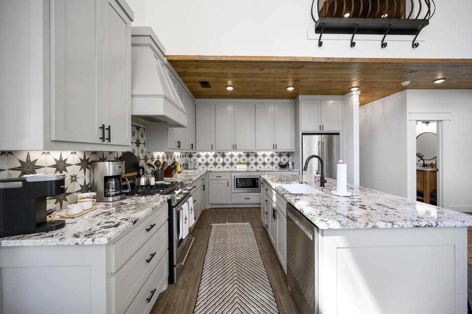 Luxury kitchen featuring stainless steel appliances and generous prep space.