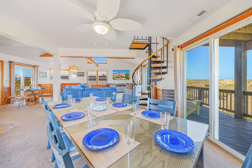 Imagine gathering around this bright, open dining area with ocean breezes and sweeping views—perfect for meals, laughter, and making memories together.