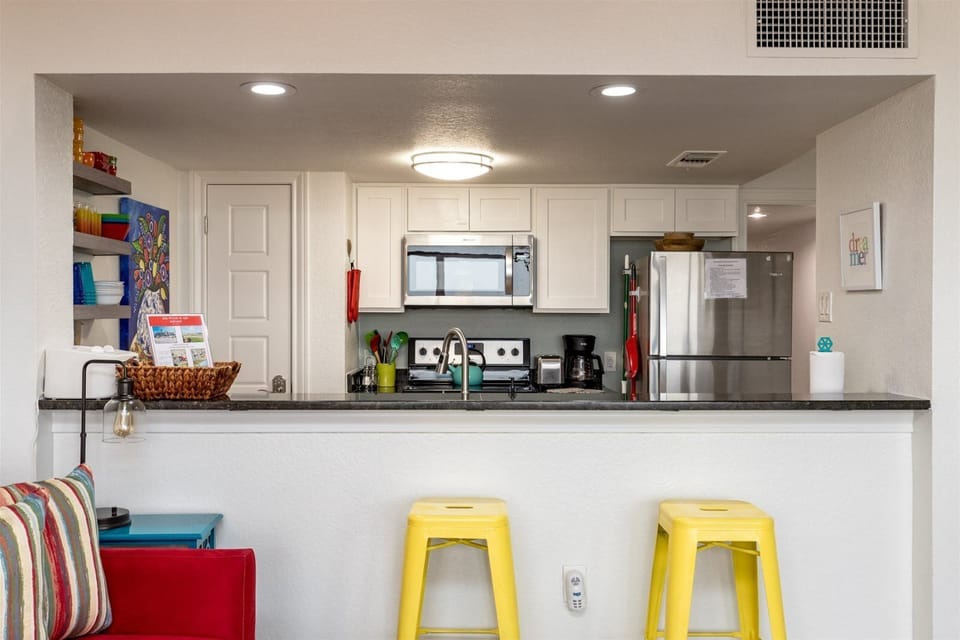The bar stools make having breakfast alfresco a breeze.