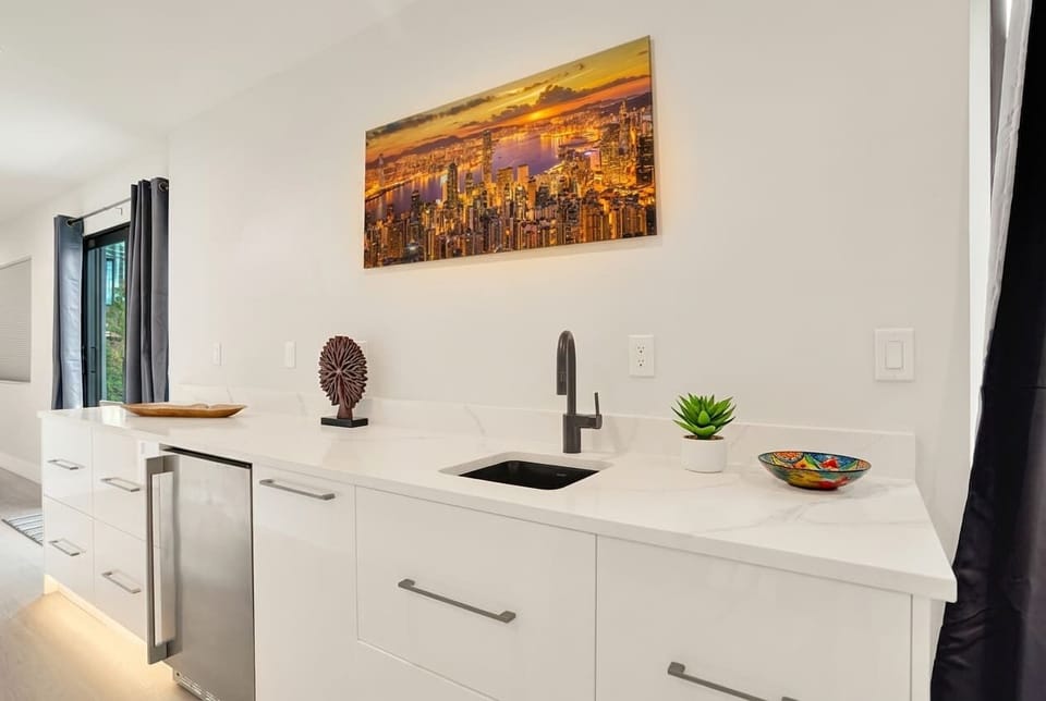 Mix up a drink or a quick snack at the wet bar on level three