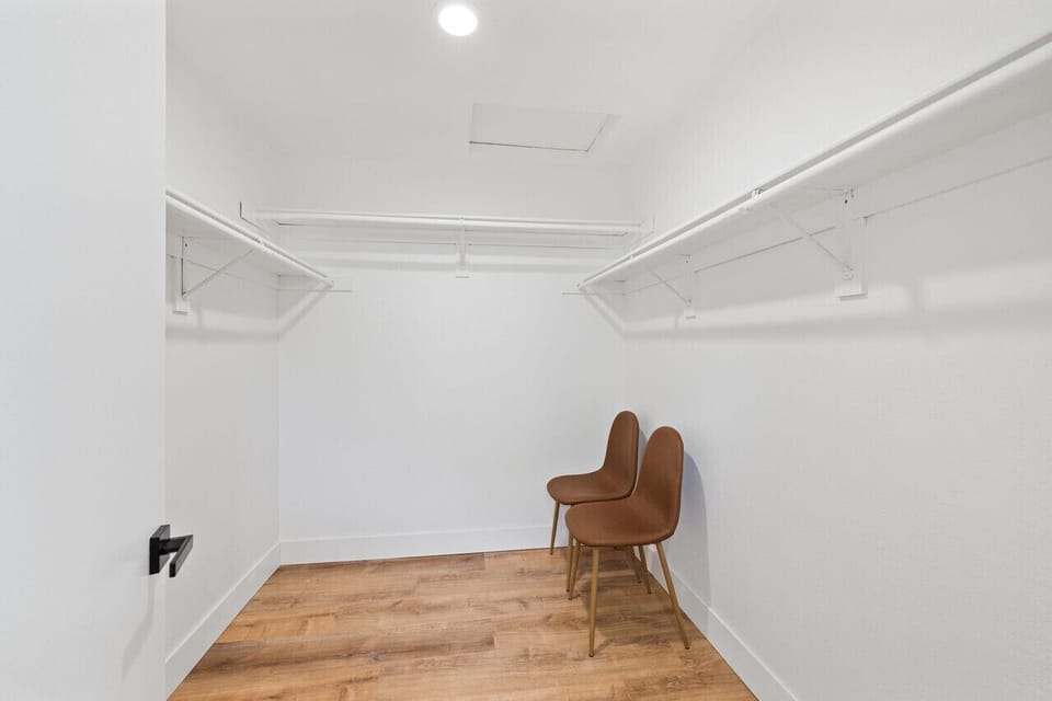 Primary closet: Extra chairs. (Not shown - Portable office desk & air mattress)