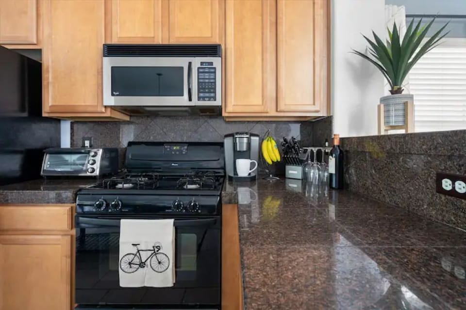 Enjoy coffee from the Keurig and use the microwave, stove, and toaster oven.