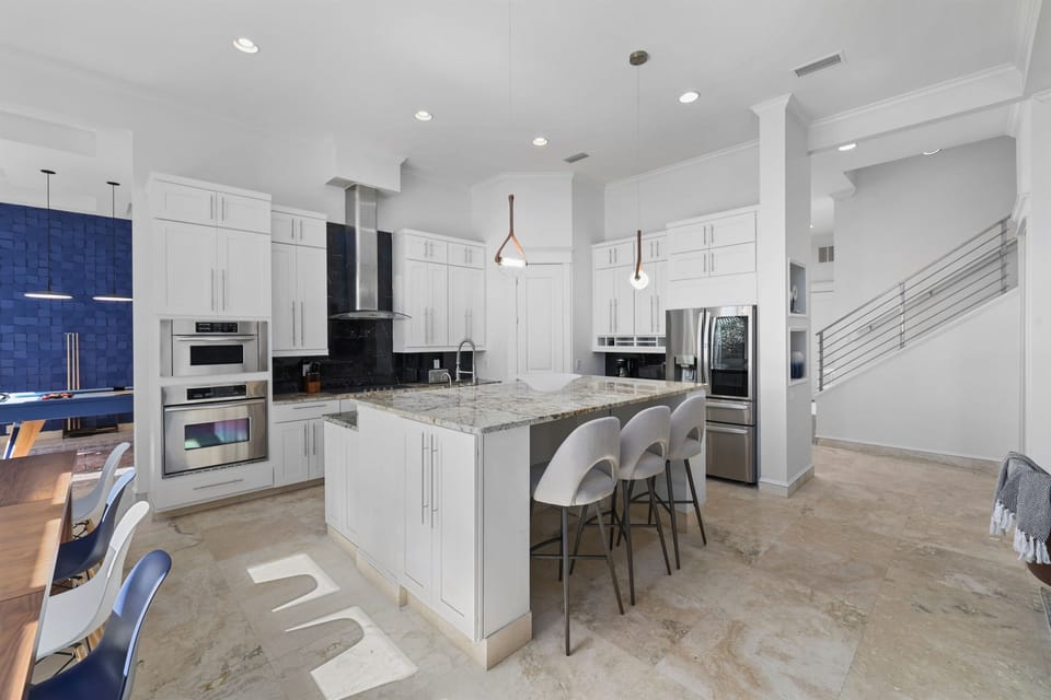 Spacious chef's kitchen with oversized island and seating