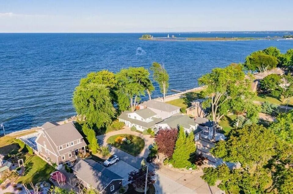 Aerial view of house looking west towards Huron Pier and Lighthouse.
