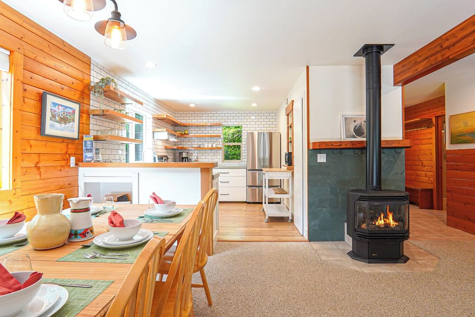 Cozy fireplace centrally located in the living room and dining room.