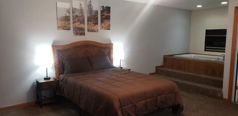 Sleep great in the comfy queen bed.  Jet tub and fireplace in Master bedroom!
