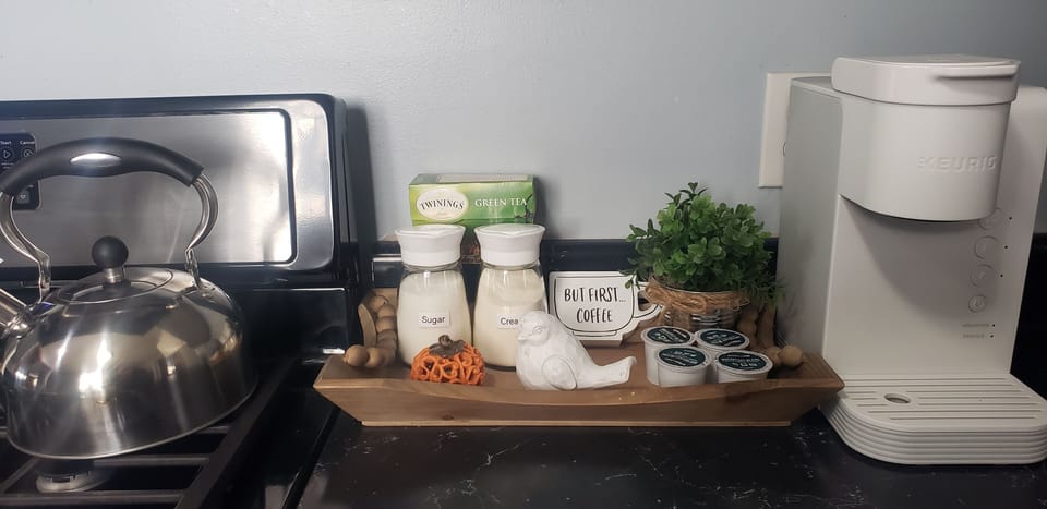 Coffee, tea, decaf, cream, sugar & mugs all provided