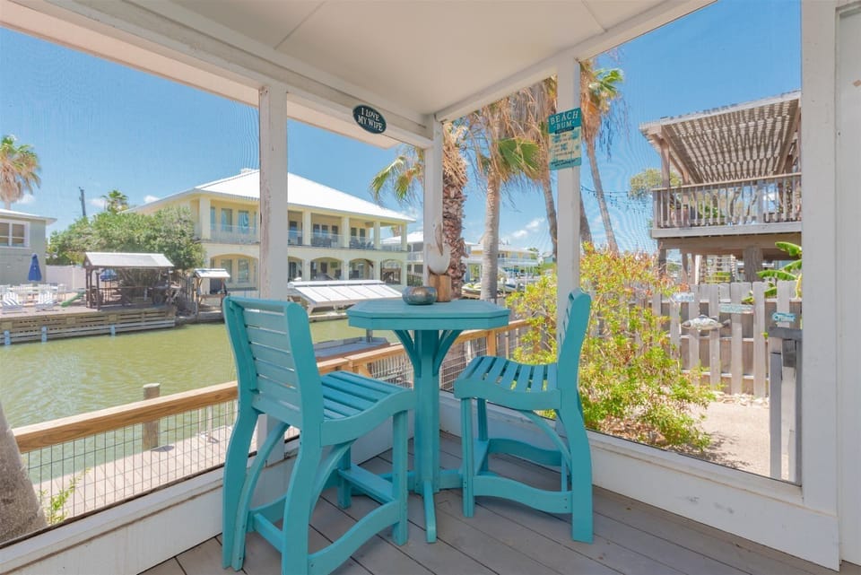 Large Screened-In Sunroom Overlooking Canal