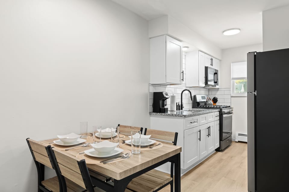 Modern kitchen meets rustic charm—cook, dine, and unwind all in one stylish space.