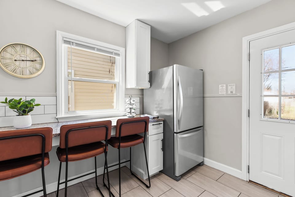 Enjoy the coffee station & breakfast bar seating area