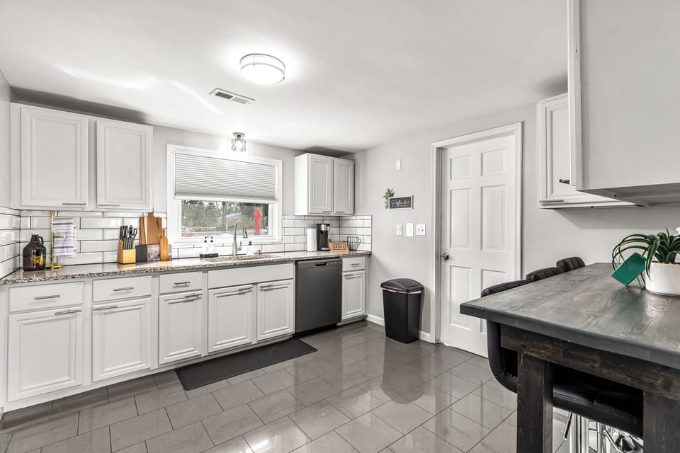 Serve your delicious meals easily at the lovely kitchen dining area.