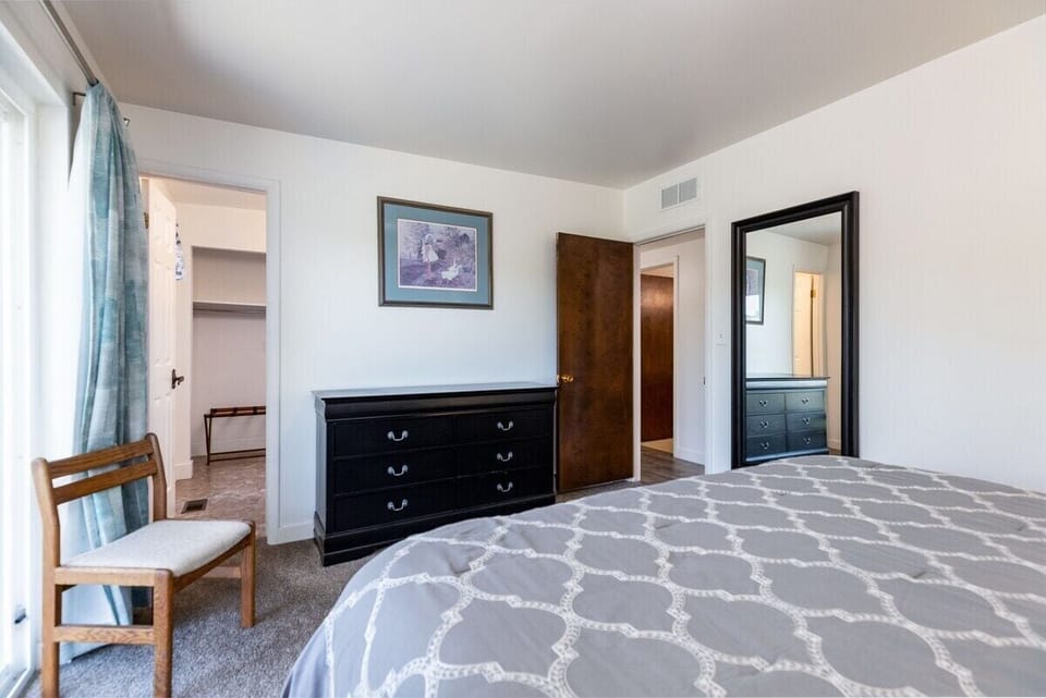 Main suite queen bedroom with bathroom