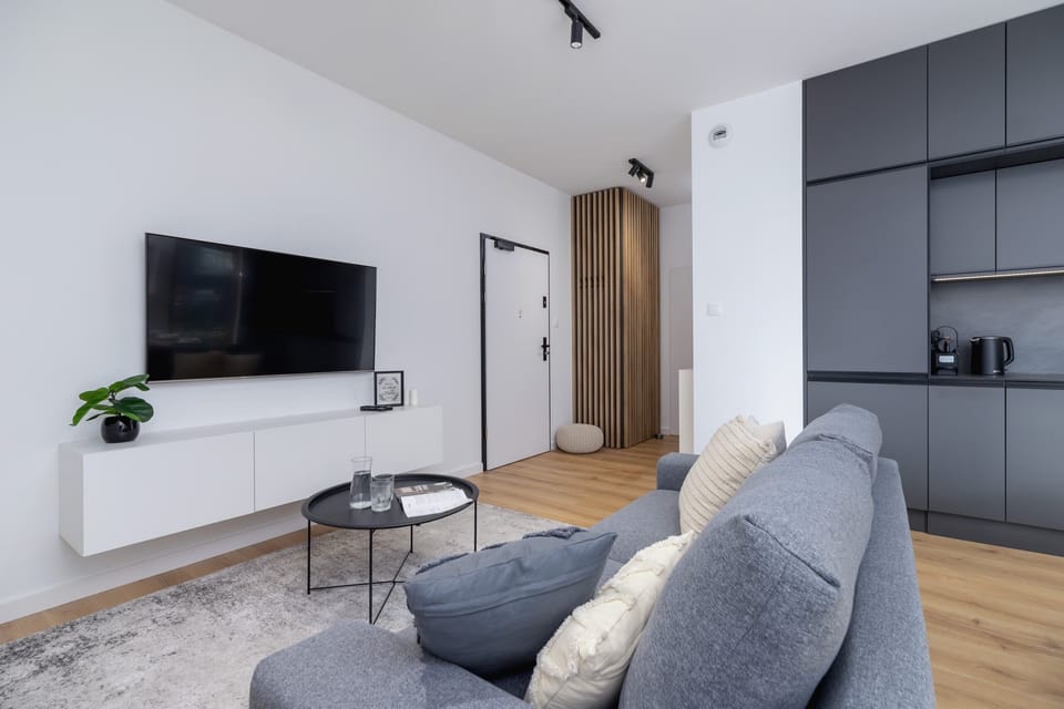 Living room with stylish decor and a neutral color palette, offering a relaxing ambiance.
