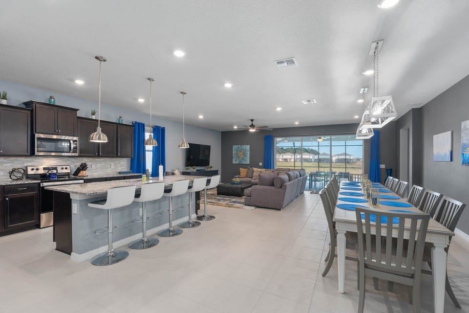 Kitchen island seats 5, table sits 14