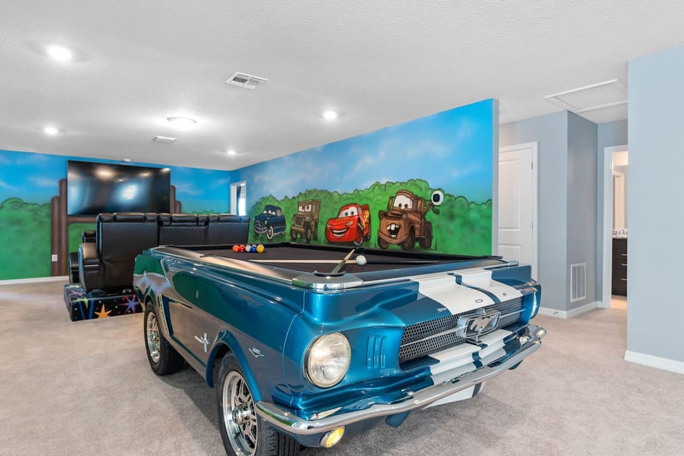 Car pool table and movie room