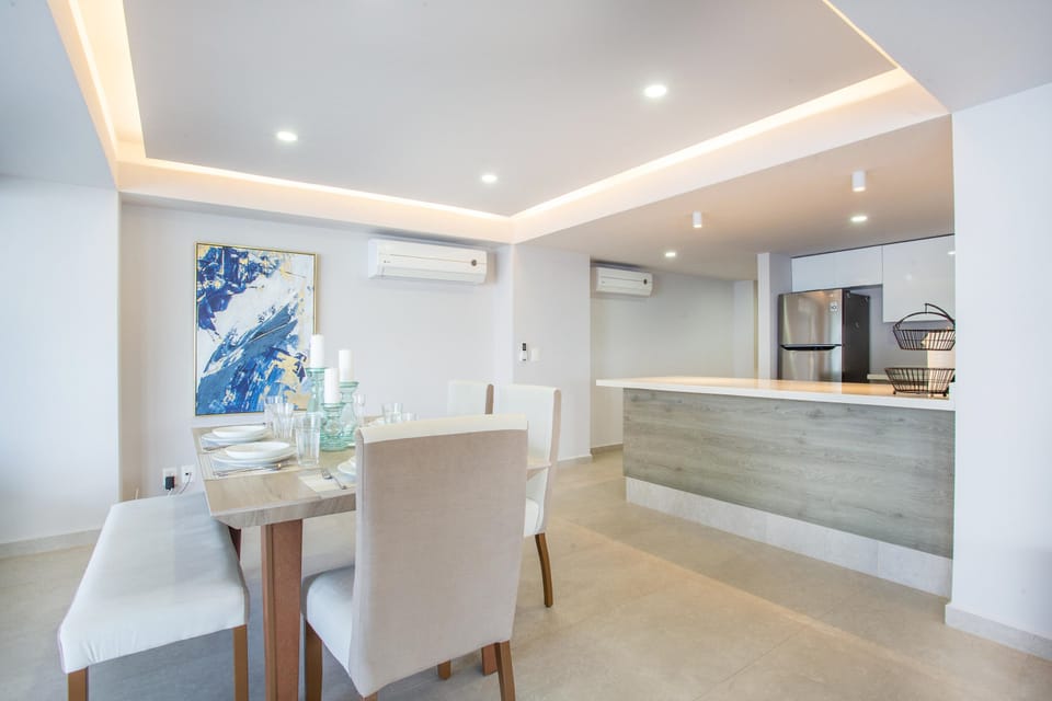 Dining table next to the kitchen to add convenience