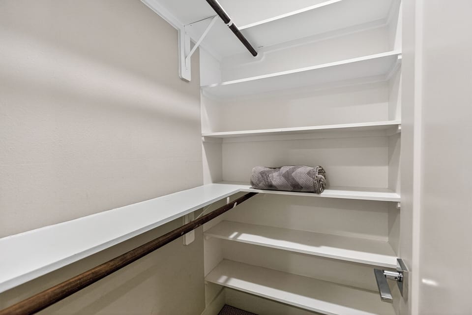 Master bedroom (2/2 closet) Walkin closet with multiple racks for cloth and belonging