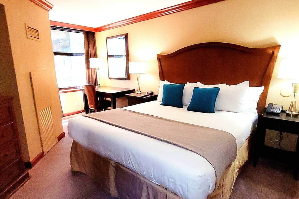 Trey's master king bed with luxury sheets