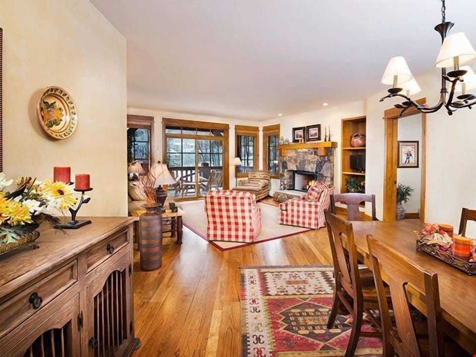 Warm up by the fireplace or entertain at the dining table.