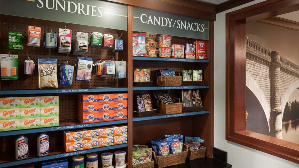 Grab a quick snack or essential items from our well-stocked sundries and snack corner for purchase.