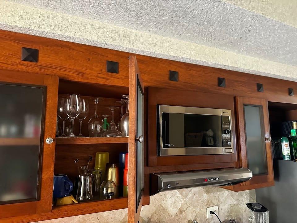 Microwave and fully stocked kitchenette