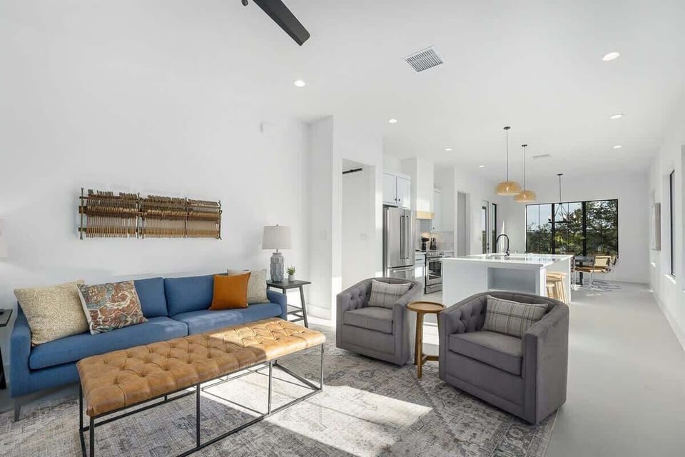 Unwind in the living room with a cozy TV setup for your enjoyment.