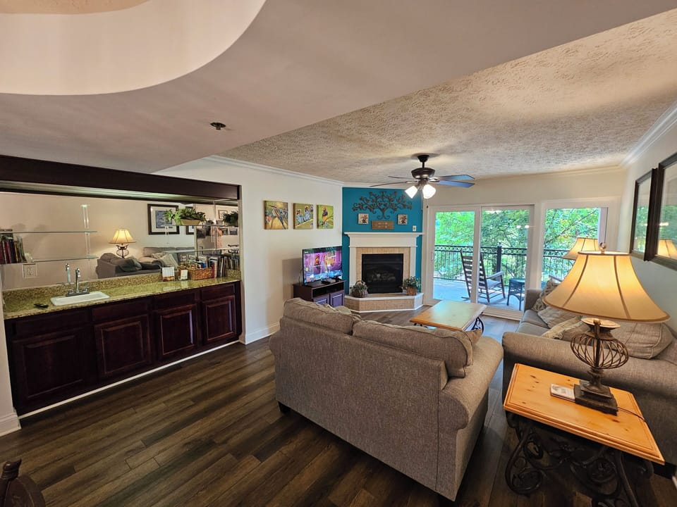Living room with board games, books and the TV has channels as well as Netflix