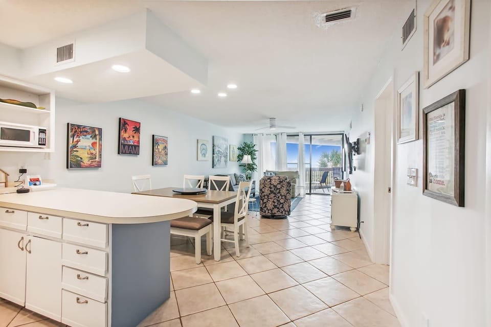 - Spacious kitchen flows seamlessly into dining and living areas for group convenience
- Bright lighting, plenty of counters, and tile floors make it functional and airy
- Perfect setup for cooking, dining, and entertaining all in one