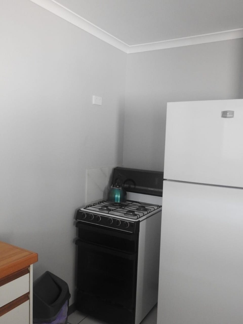 Gas range.
Large kitchen fridge