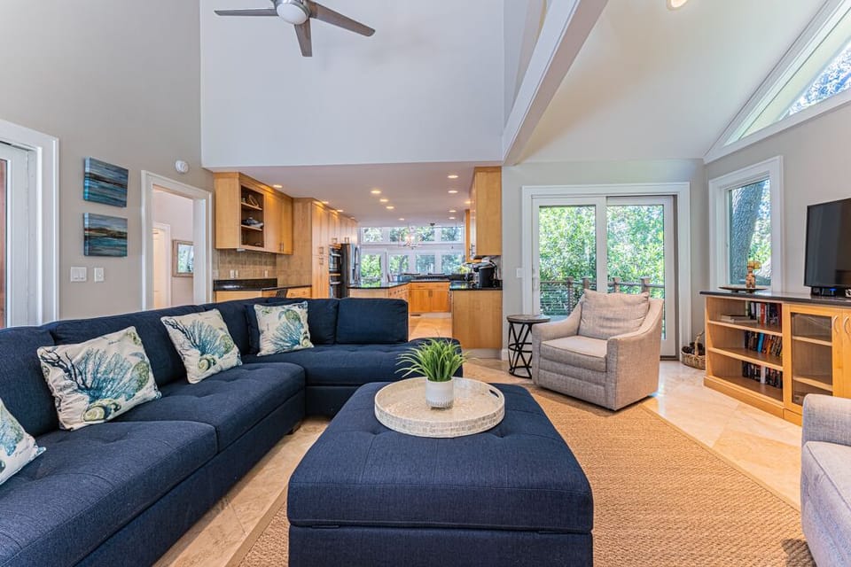 Large sectional Sofa with ottoman and two chairs.